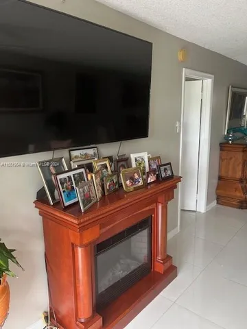 a stove top oven sitting inside of a kitchen