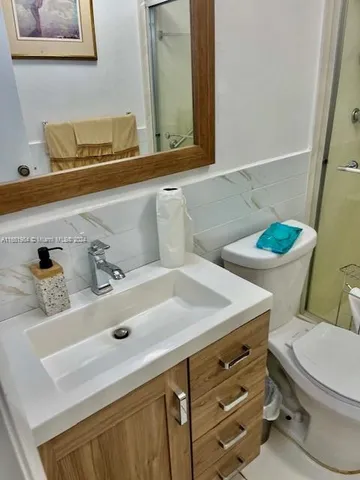 a bathroom with a sink and a toilet