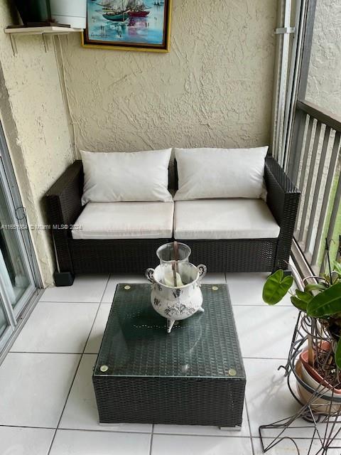 6100 Northwest 44th Street, Unit 405 Lauderhill, FL 33319 - Photo 40 of 46 a living room with furniture and a couch