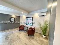 6100 Northwest 44th Street, Unit 405 Lauderhill, FL 33319 - Photo 4 of 46 a living room with furniture