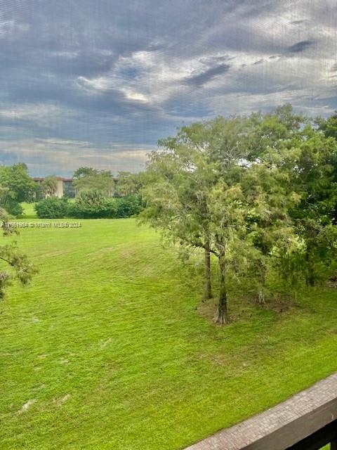 6100 Northwest 44th Street, Unit 405 Lauderhill, FL 33319 - Photo 45 of 46 a view of an ocean from a yard