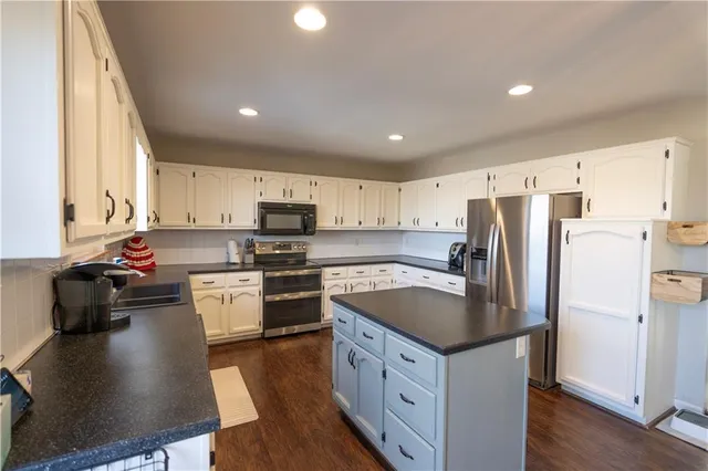 $320,000 | 320 Shenandoah Drive, Raymore, MO 64083