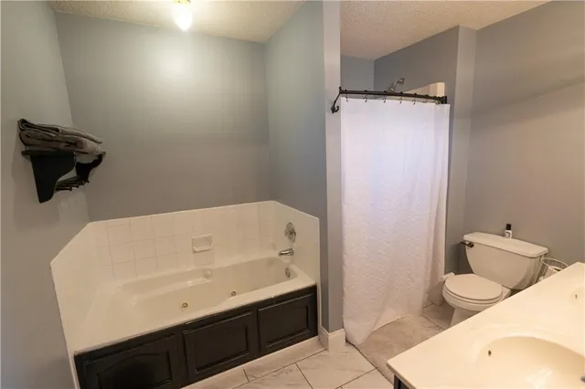 $320,000 | 320 Shenandoah Drive, Raymore, MO 64083