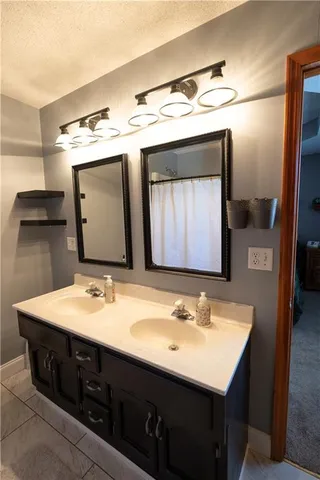 $320,000 | 320 Shenandoah Drive, Raymore, MO 64083