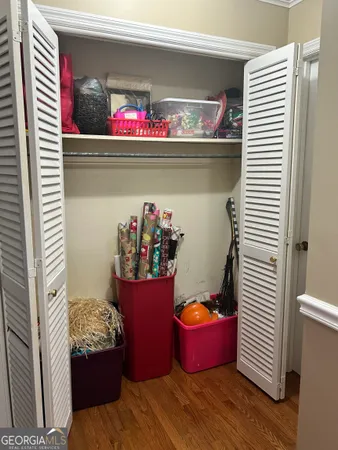 a bedroom with a bed and furniture