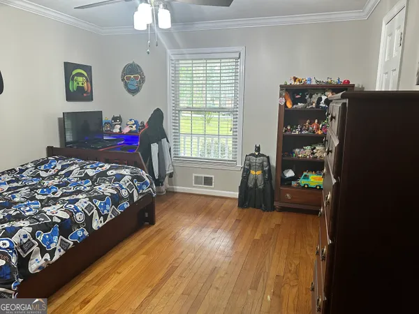 a view of a balcony with wooden floor