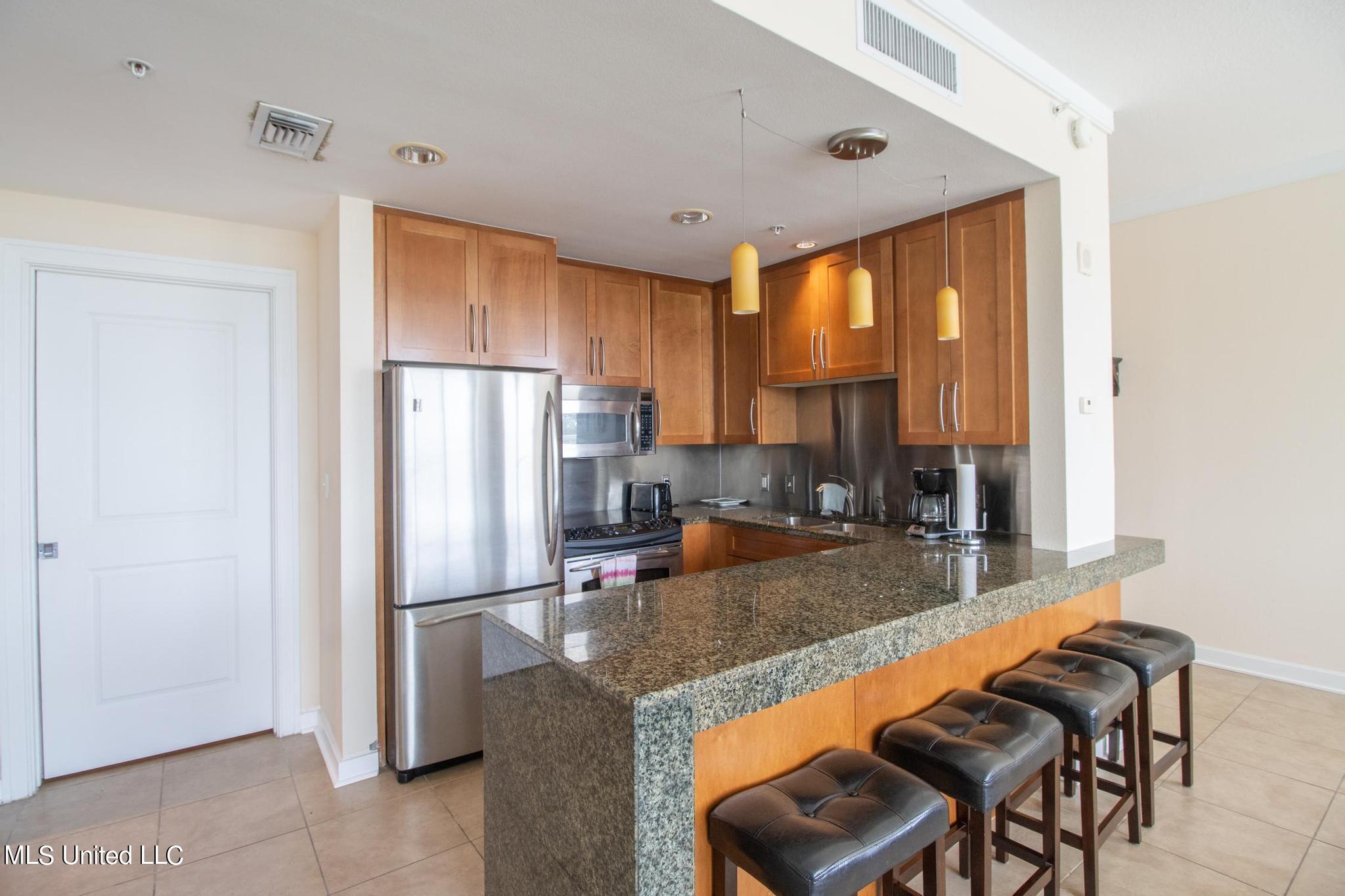 2060 Beach Boulevard, Unit 103 Biloxi, MS 39531 - Photo 6 of 17 OC103-53007