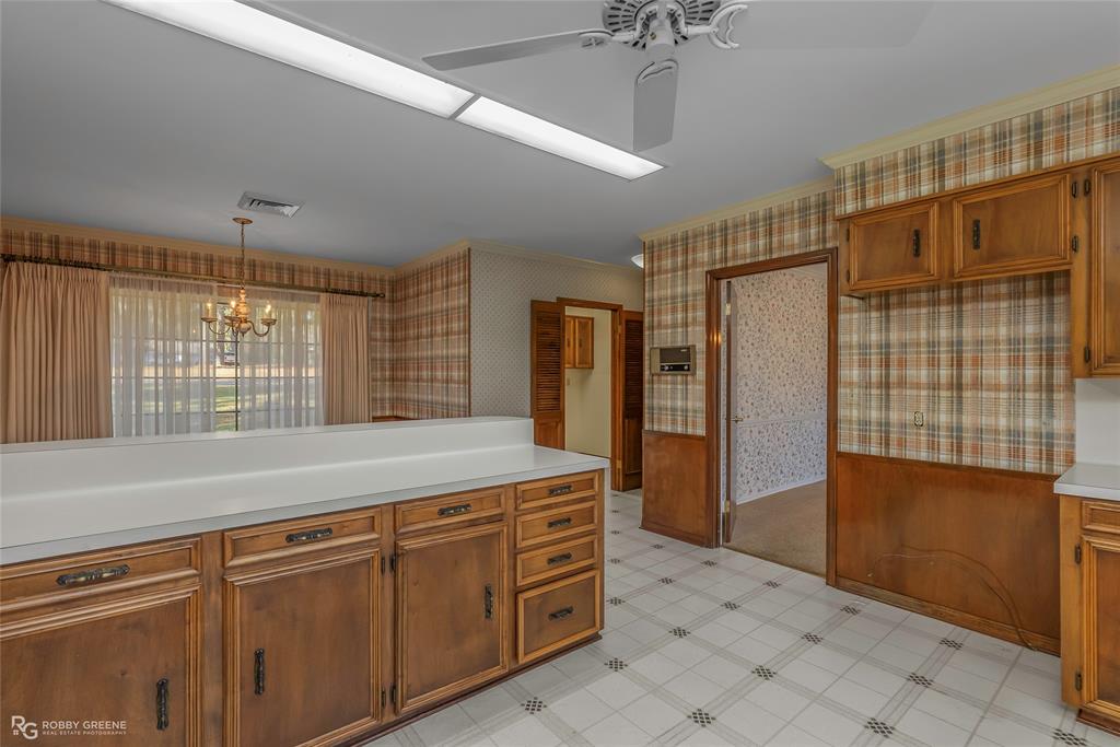 3073 Risinger Drive Shreveport, LA 71119 - Photo 14 of 39 a kitchen with stainless steel appliances granite countertop a refrigerator and a sink