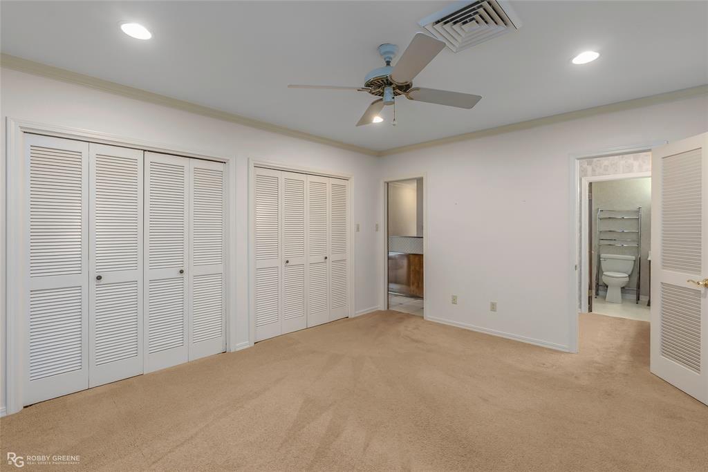 3073 Risinger Drive Shreveport, LA 71119 - Photo 19 of 39 an empty room with fan and entrance