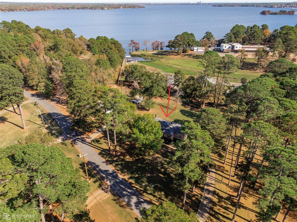 3073 Risinger Drive Shreveport, LA 71119 - Photo 2 of 39 a view of a houses with a lake view