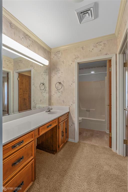 3073 Risinger Drive Shreveport, LA 71119 - Photo 27 of 39 a spacious bathroom with a granite countertop sink mirror and a bathtub