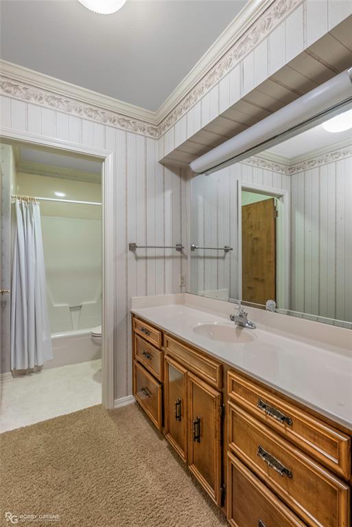 3073 Risinger Drive Shreveport, LA 71119 - Photo 31 of 39 a bathroom with a granite countertop sink and a mirror