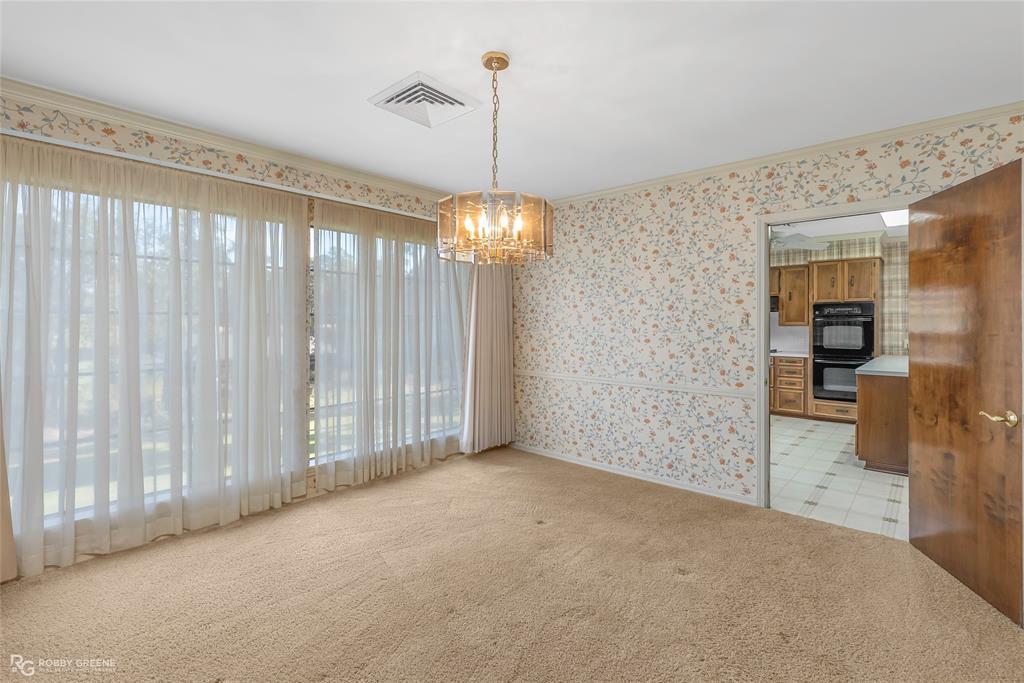 3073 Risinger Drive Shreveport, LA 71119 - Photo 9 of 39 a view of a room with a water heater room