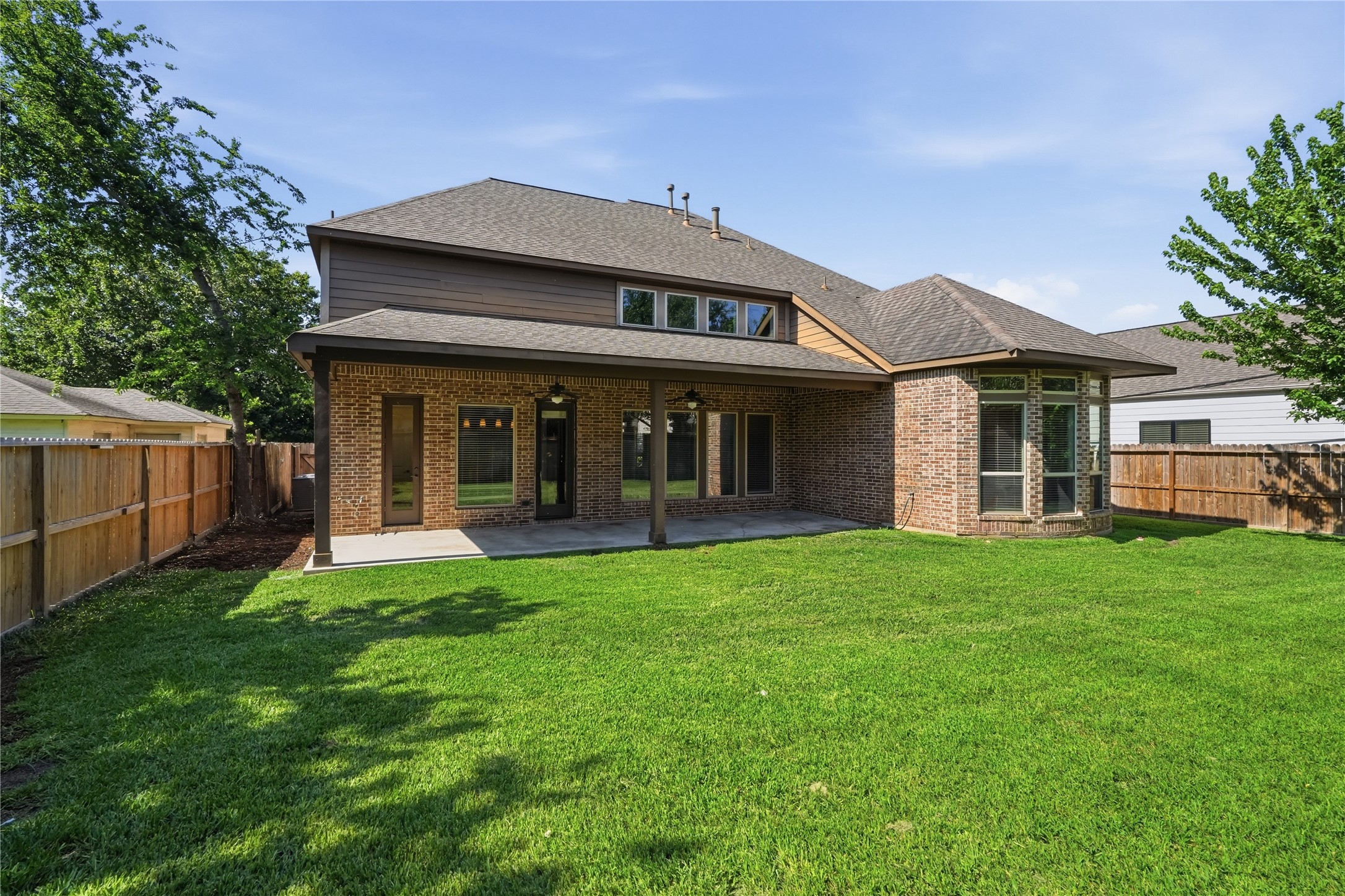 6429 Remlap Street Houston, TX 77055 - Photo 25 of 30 Expansive backyard and covered patio create an ideal setting for gatherings, play, and year-round outdoor living.