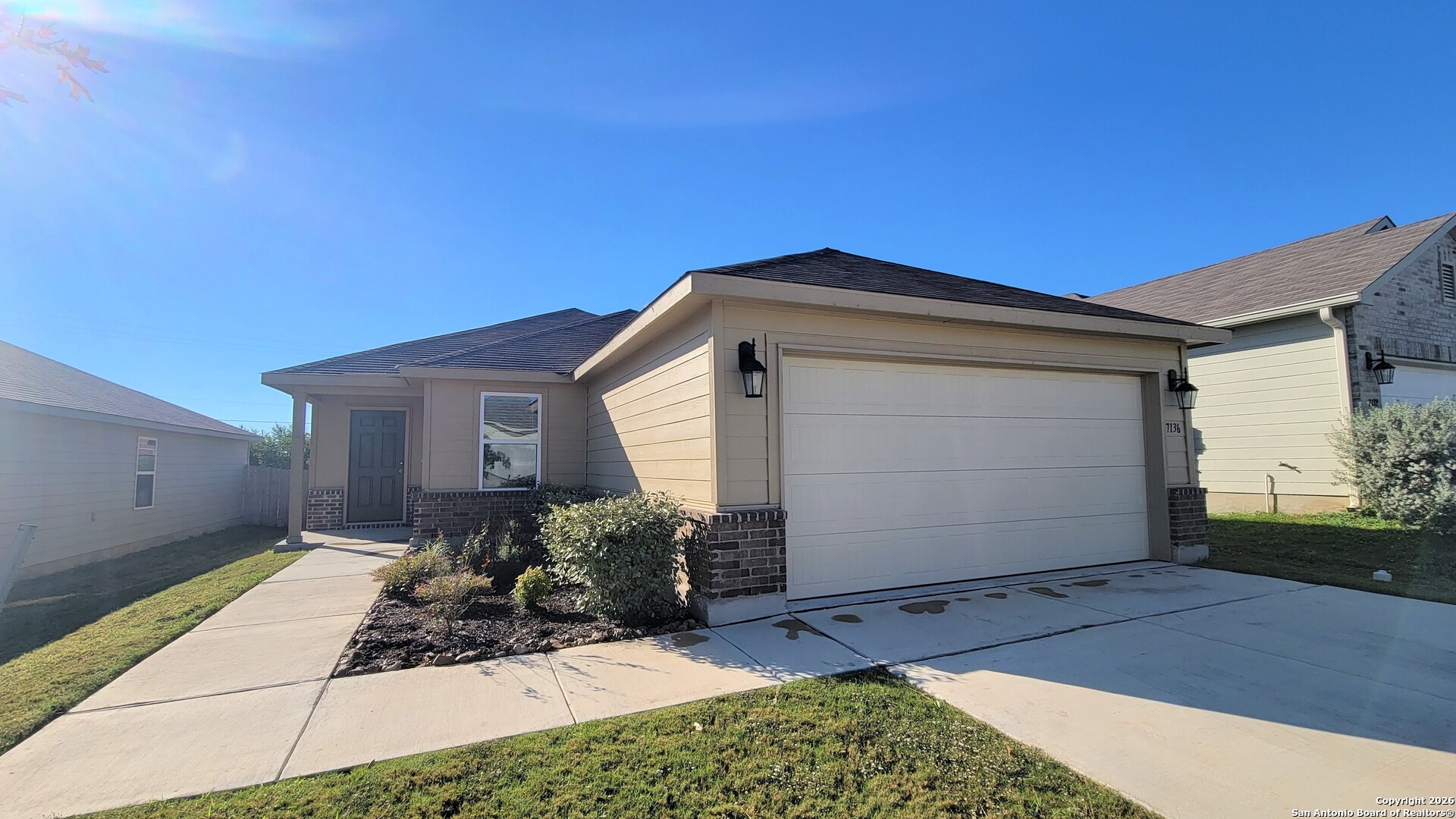 a front view of house with yard