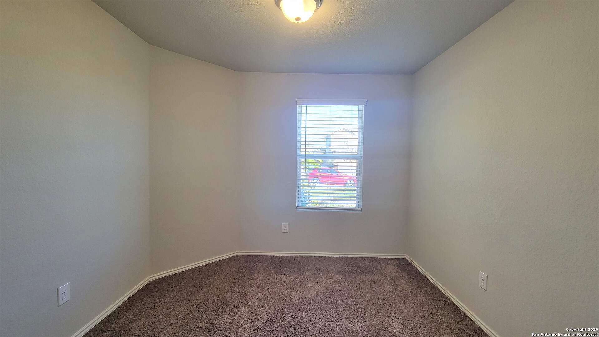 7136 Quarter Moon Converse, TX 78109 - Photo 13 of 22 an empty room with a window