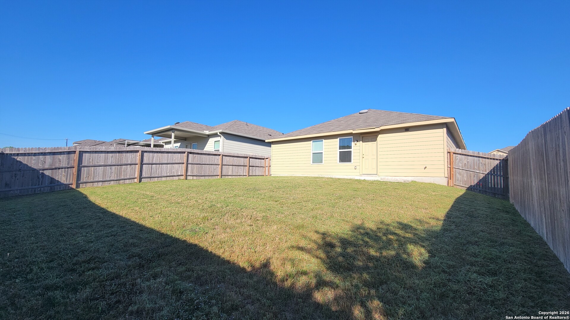 7136 Quarter Moon Converse, TX 78109 - Photo 18 of 22 a view of a backyard