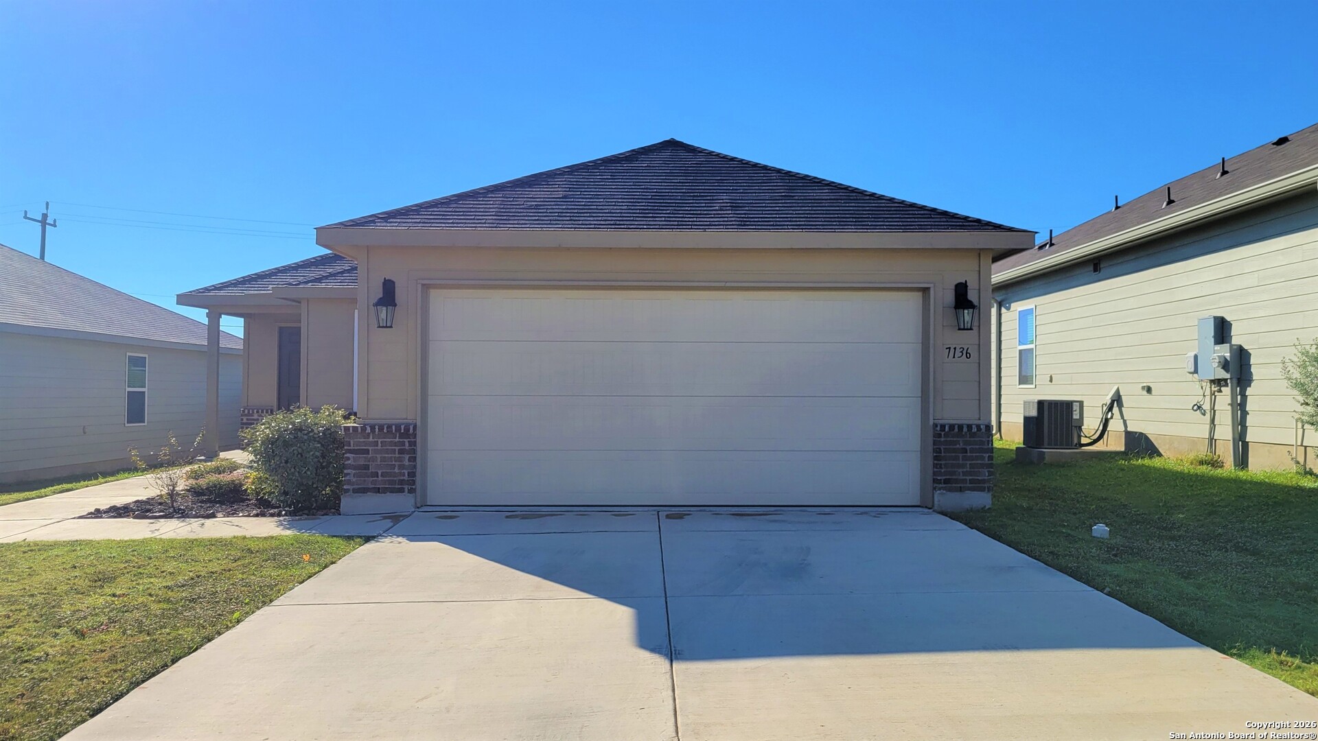 7136 Quarter Moon Converse, TX 78109 - Photo 2 of 22 a front view of a house with garden