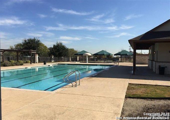 7136 Quarter Moon Converse, TX 78109 - Photo 22 of 22 a view of swimming pool with a yard