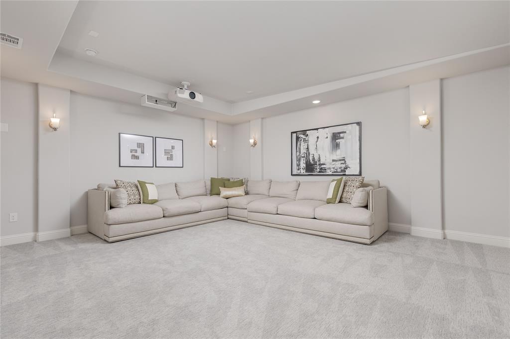 7409 Cormac Street McKinney, TX 75071 - Photo 22 of 40 The media room is located off of the game room on level two.