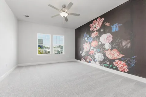 en empty room with windows