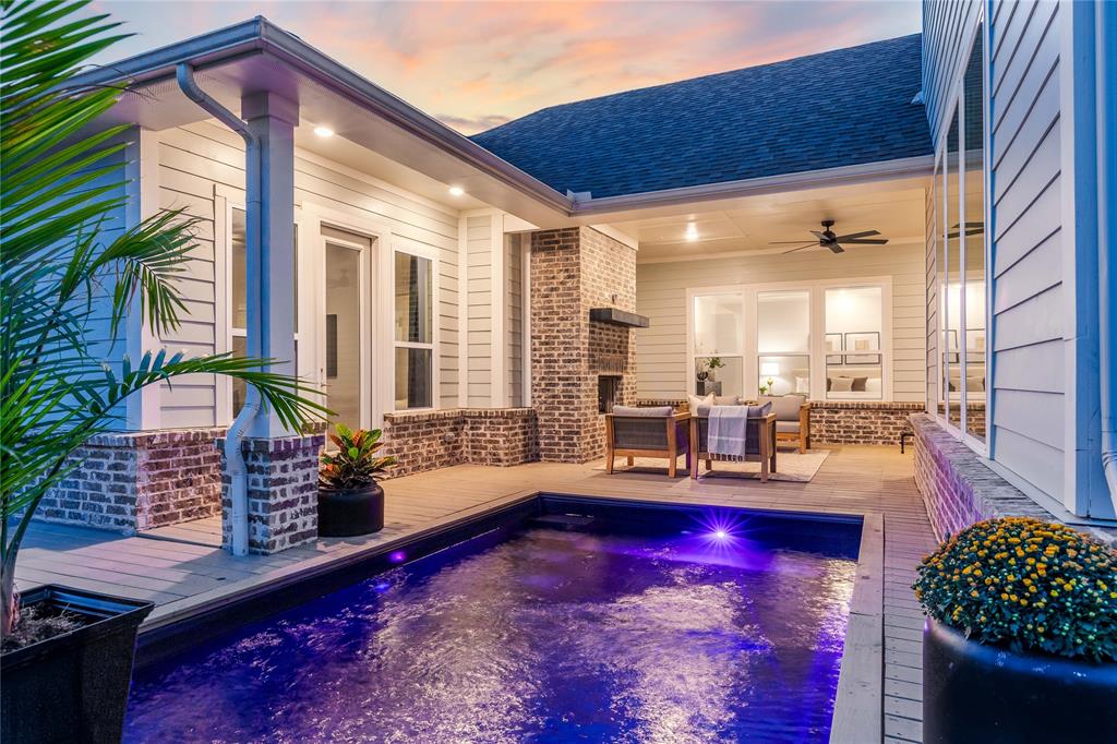 7409 Cormac Street McKinney, TX 75071 - Photo 3 of 40 Swimming pool looking back towards the covered patio and casita.