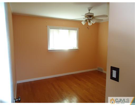 12 Crescent Road Edison, NJ 08817 - Photo 9 of 11 a view of an empty room and a window