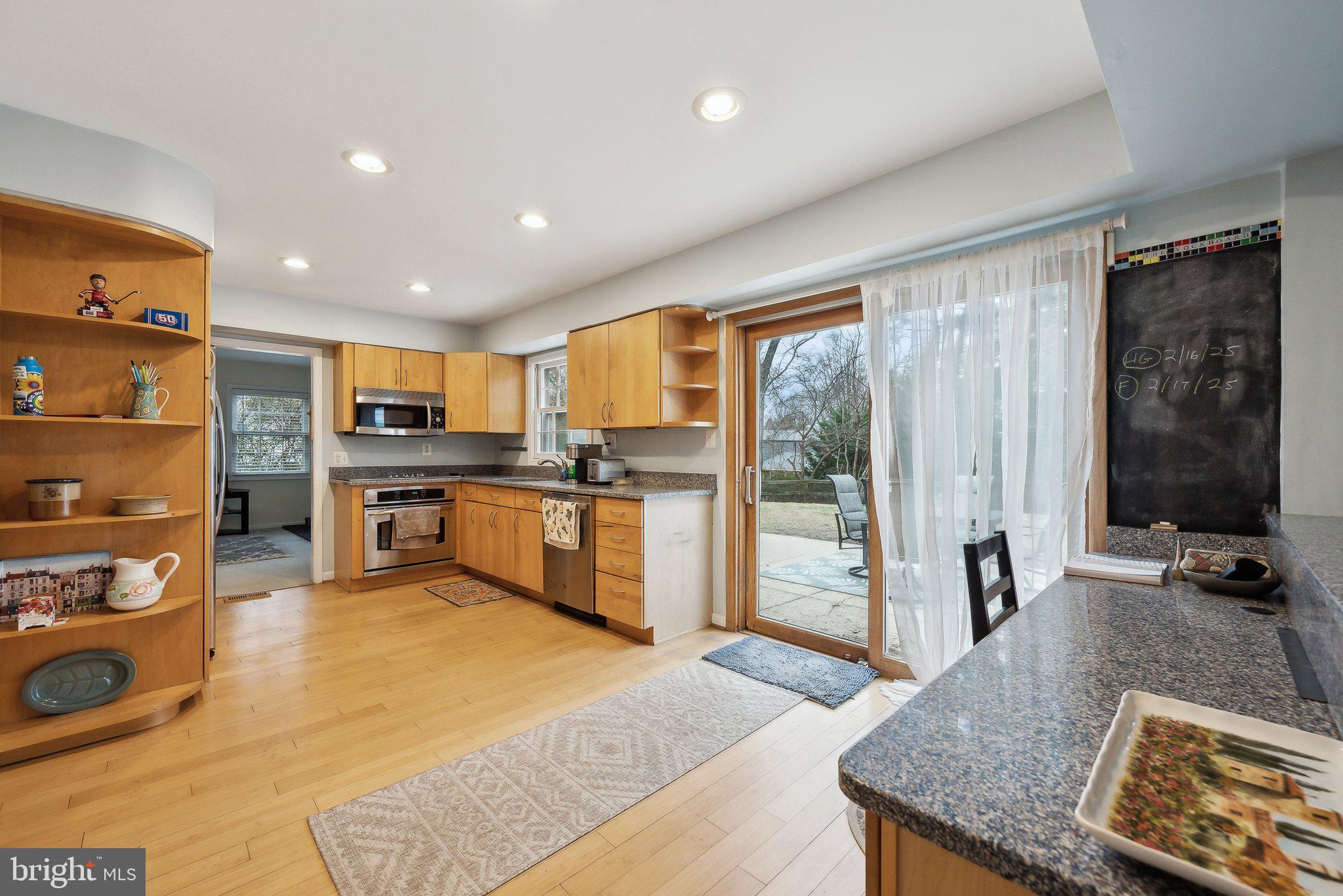 2940 Beaverwood Lane Silver Spring, MD 20906 - Photo 4 of 26 Large kitchen opens to the patio and yard