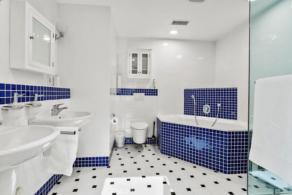 27242 Cordero Lane Mission Viejo, CA 92691 - Photo 18 of 39 a bathroom with a sink toilet and shower