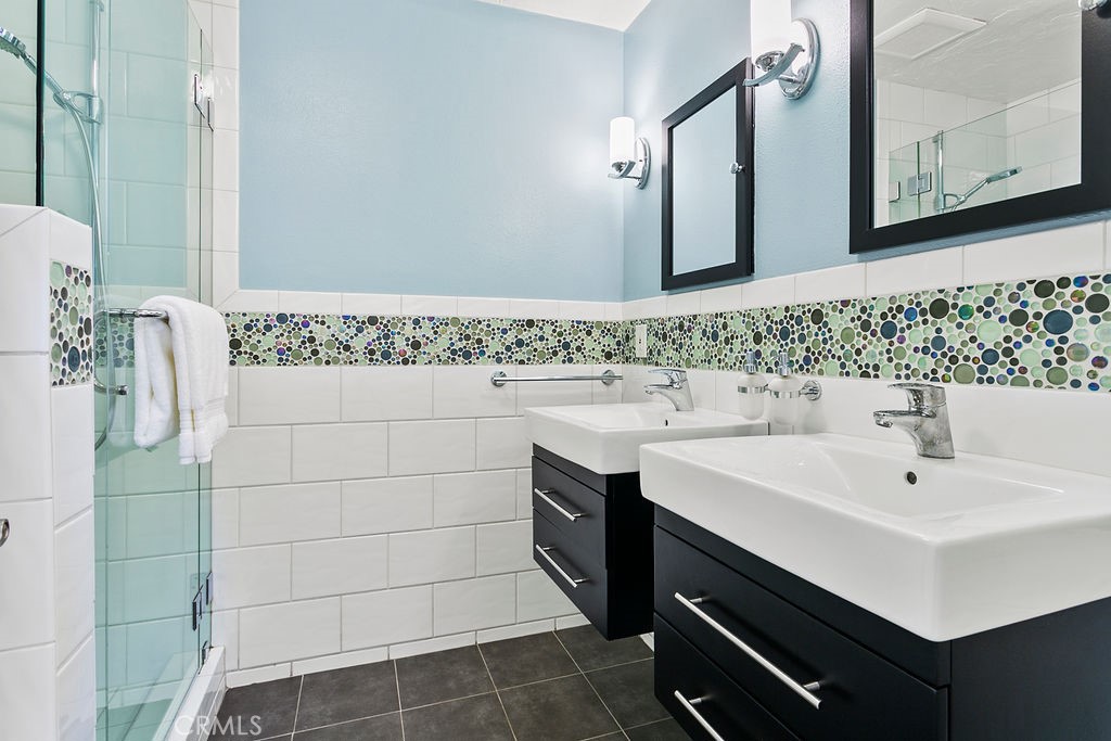27242 Cordero Lane Mission Viejo, CA 92691 - Photo 21 of 39 a bathroom with a sink and a mirror