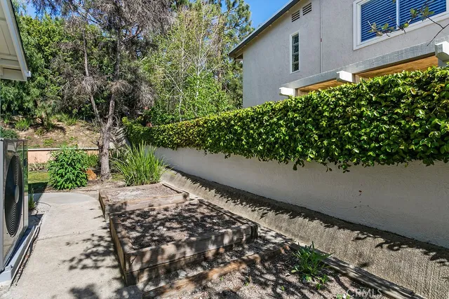 a view of a garden with pathway
