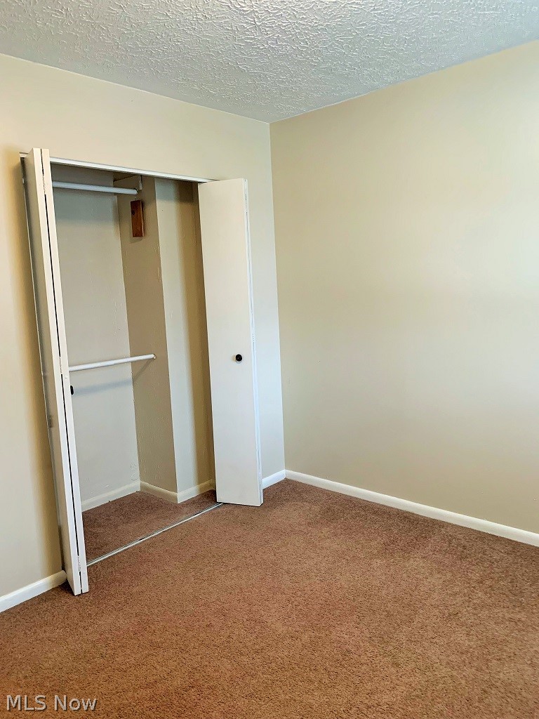 2480 Raber Road, Unit 6D Uniontown, OH 44685 - Photo 17 of 24 Closet in bd 2