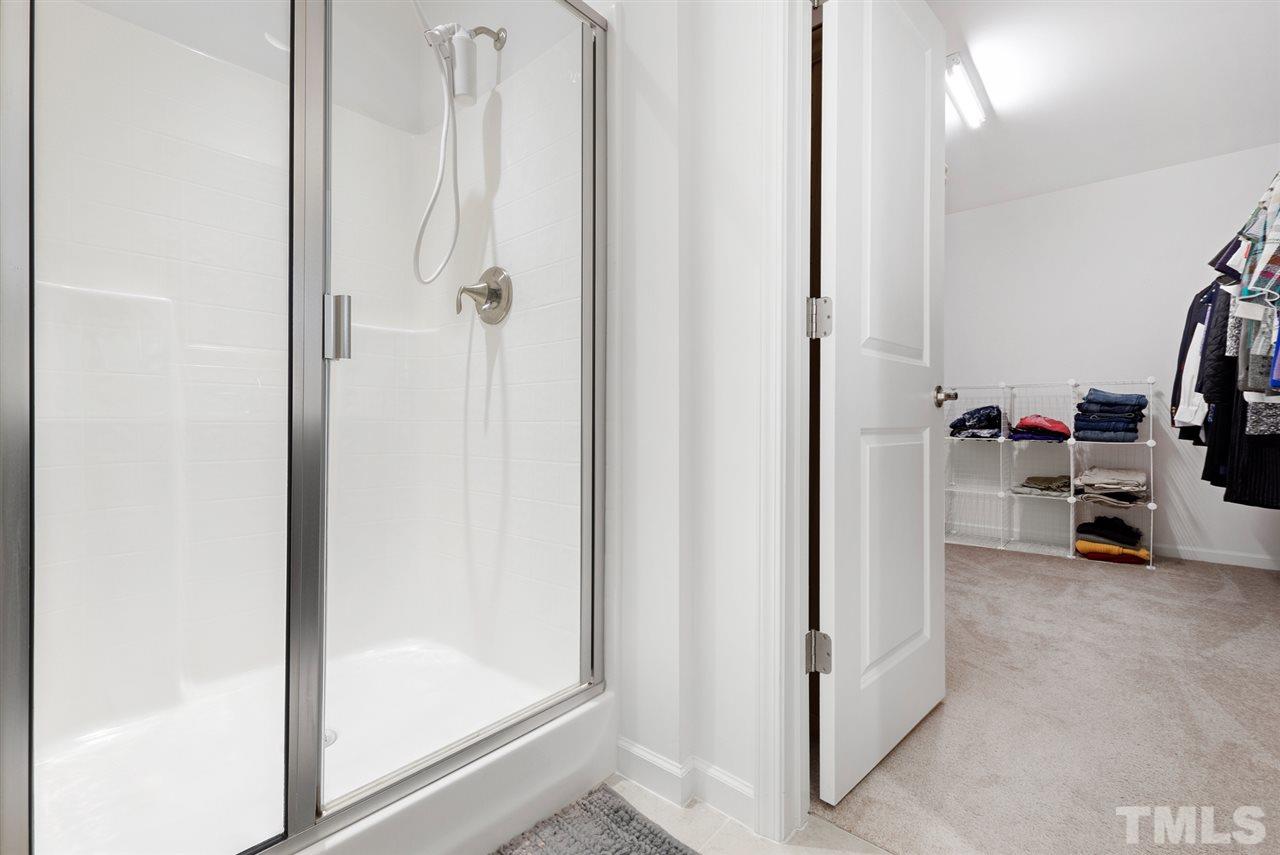 1013 Traditions Meadow Drive Wake Forest, NC 27587 - Photo 19 of 30 a view of a livingroom with a flat screen tv