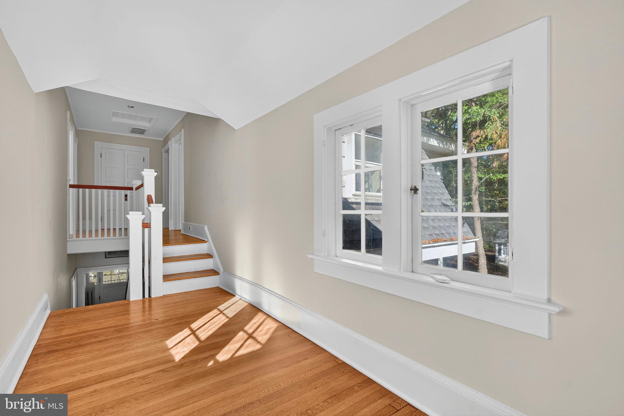4561 Weston Road Catlett, VA 20119 - Photo 38 of 59 a view of a bedroom with wooden floor and staircase
