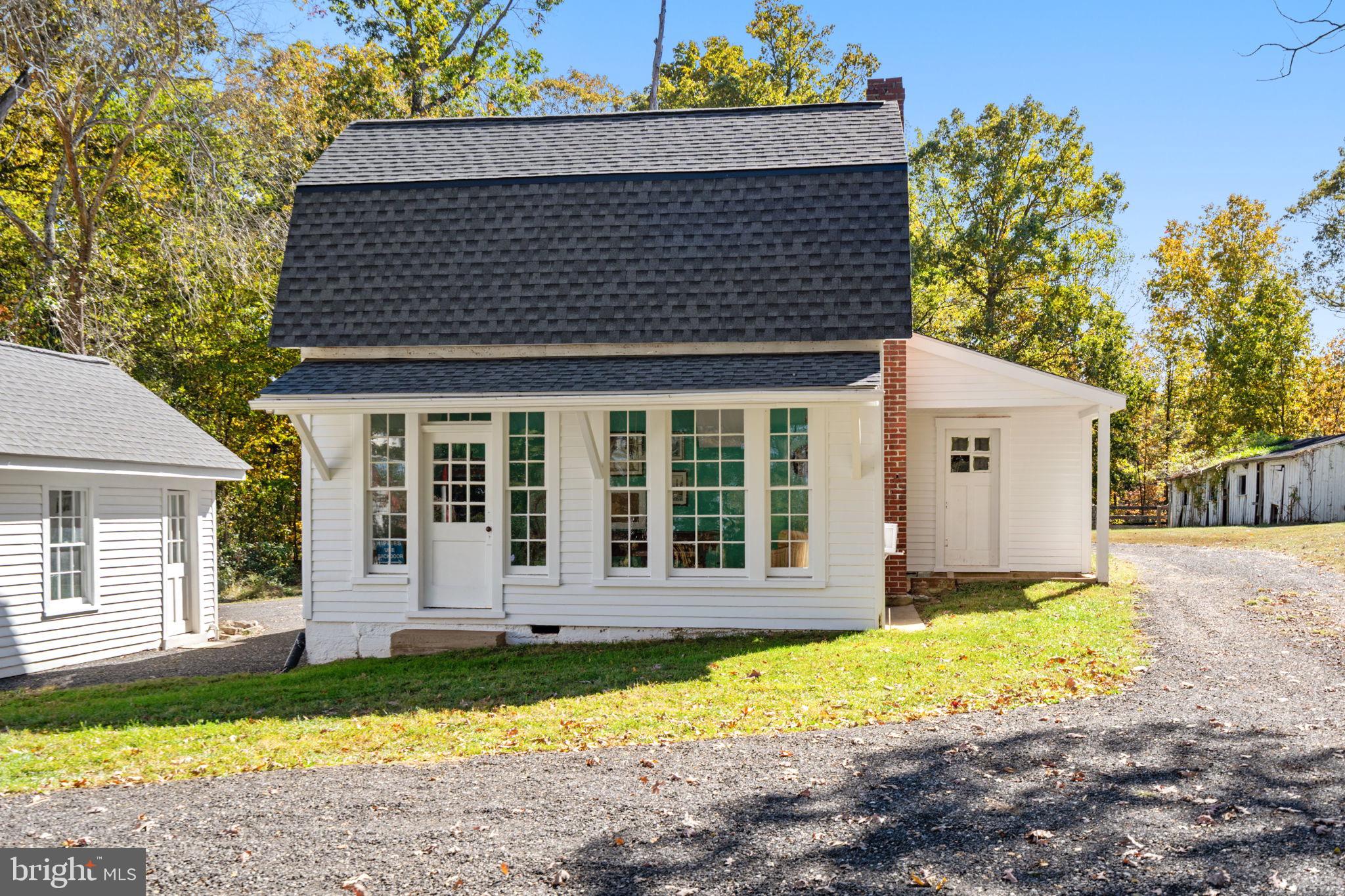 4561 Weston Road Catlett, VA 20119 - Photo 41 of 59 a front view of a house with a yard outdoor seating and garage