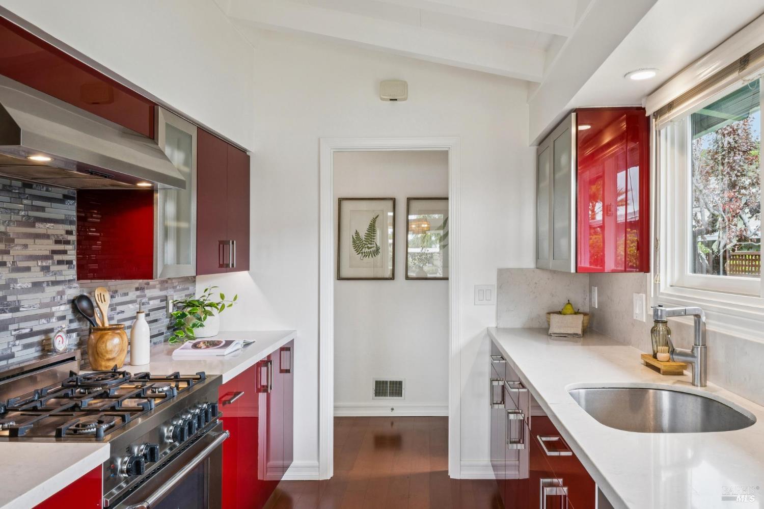 20 Porto Bello Drive San Rafael, CA 94901 - Photo 14 of 54 a kitchen that has a sink and a stove