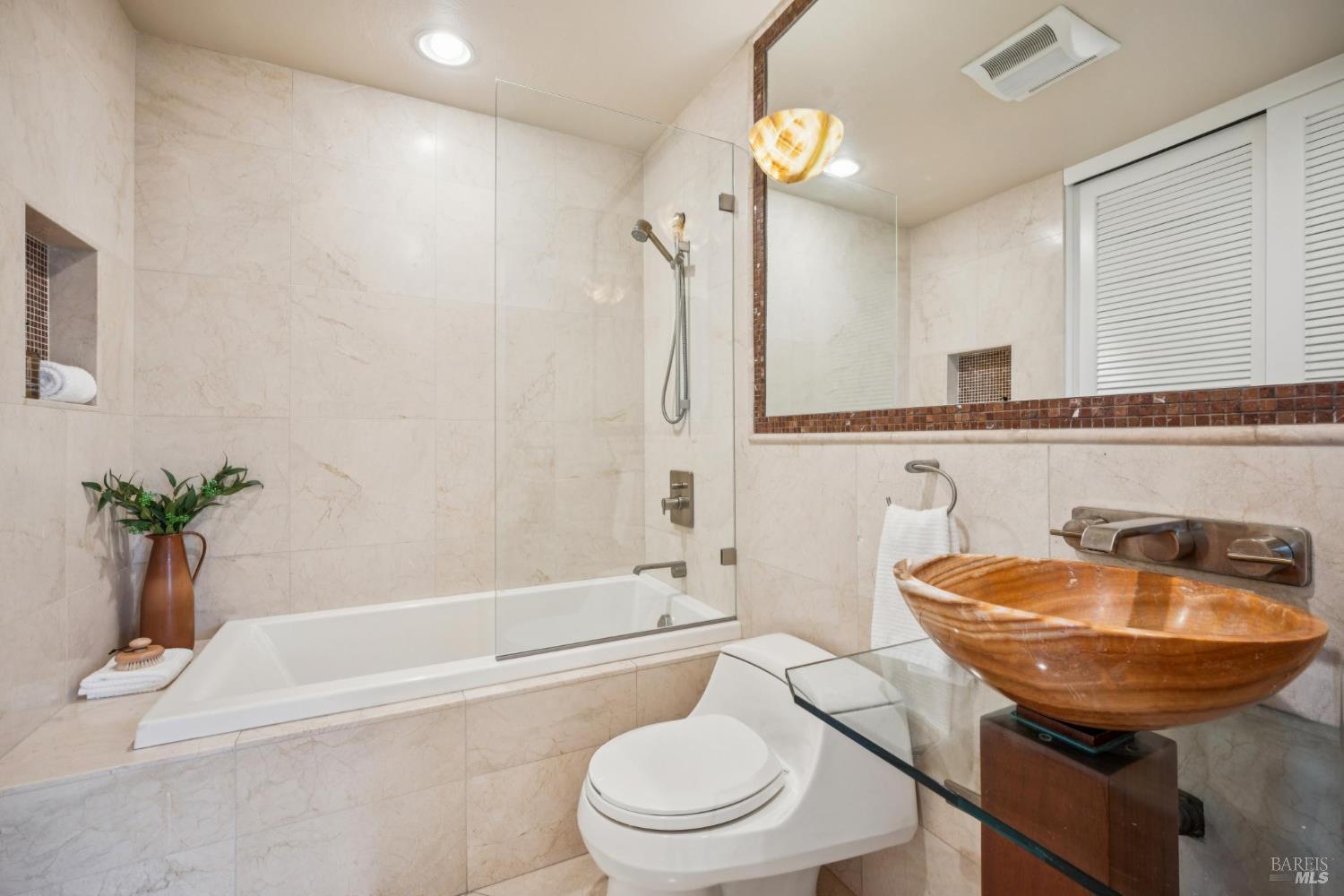 20 Porto Bello Drive San Rafael, CA 94901 - Photo 17 of 54 a bathroom with a sink a toilet and shower