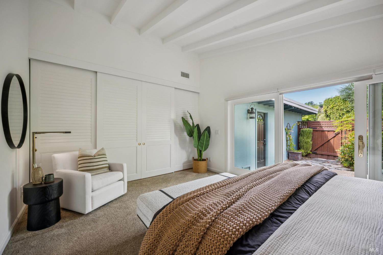 20 Porto Bello Drive San Rafael, CA 94901 - Photo 20 of 54 a bedroom with a bed and a couch