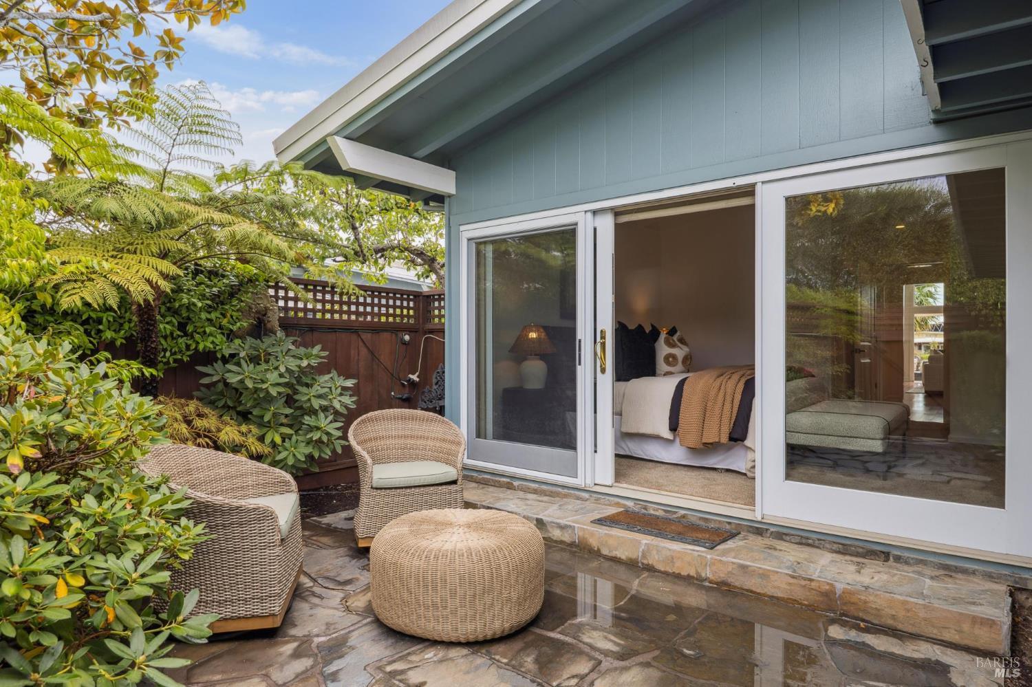 20 Porto Bello Drive San Rafael, CA 94901 - Photo 22 of 54 a view of a patio with table and chairs potted plants