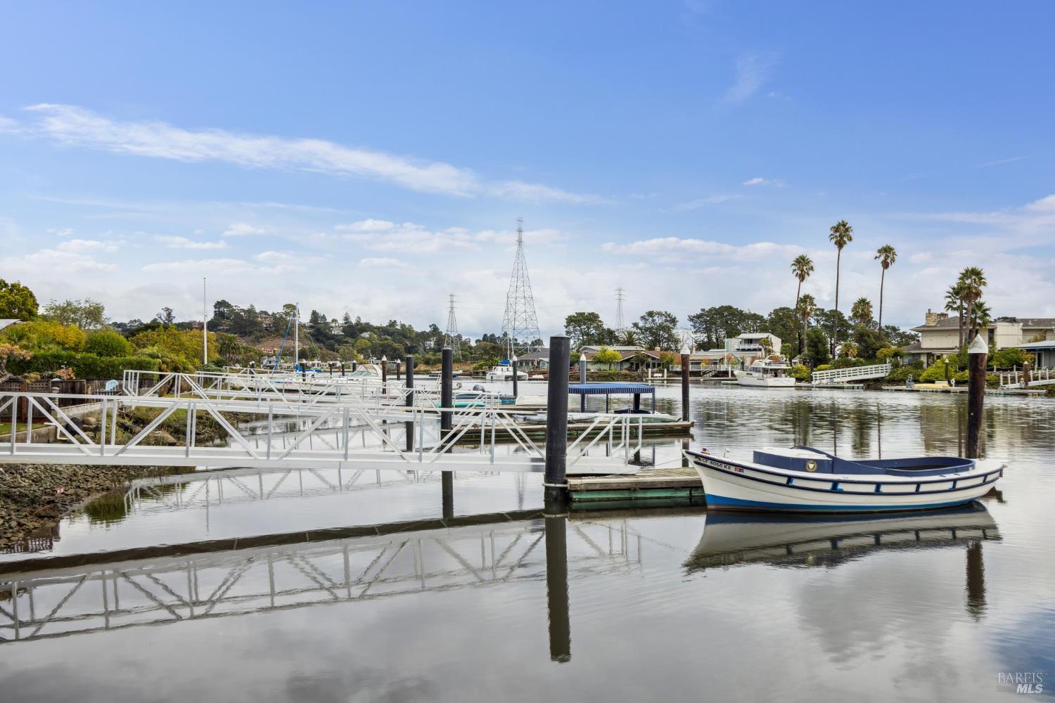 20 Porto Bello Drive San Rafael, CA 94901 - Photo 44 of 54 a lake view with a table and chairs