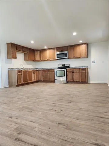 a view of kitchen and microwave
