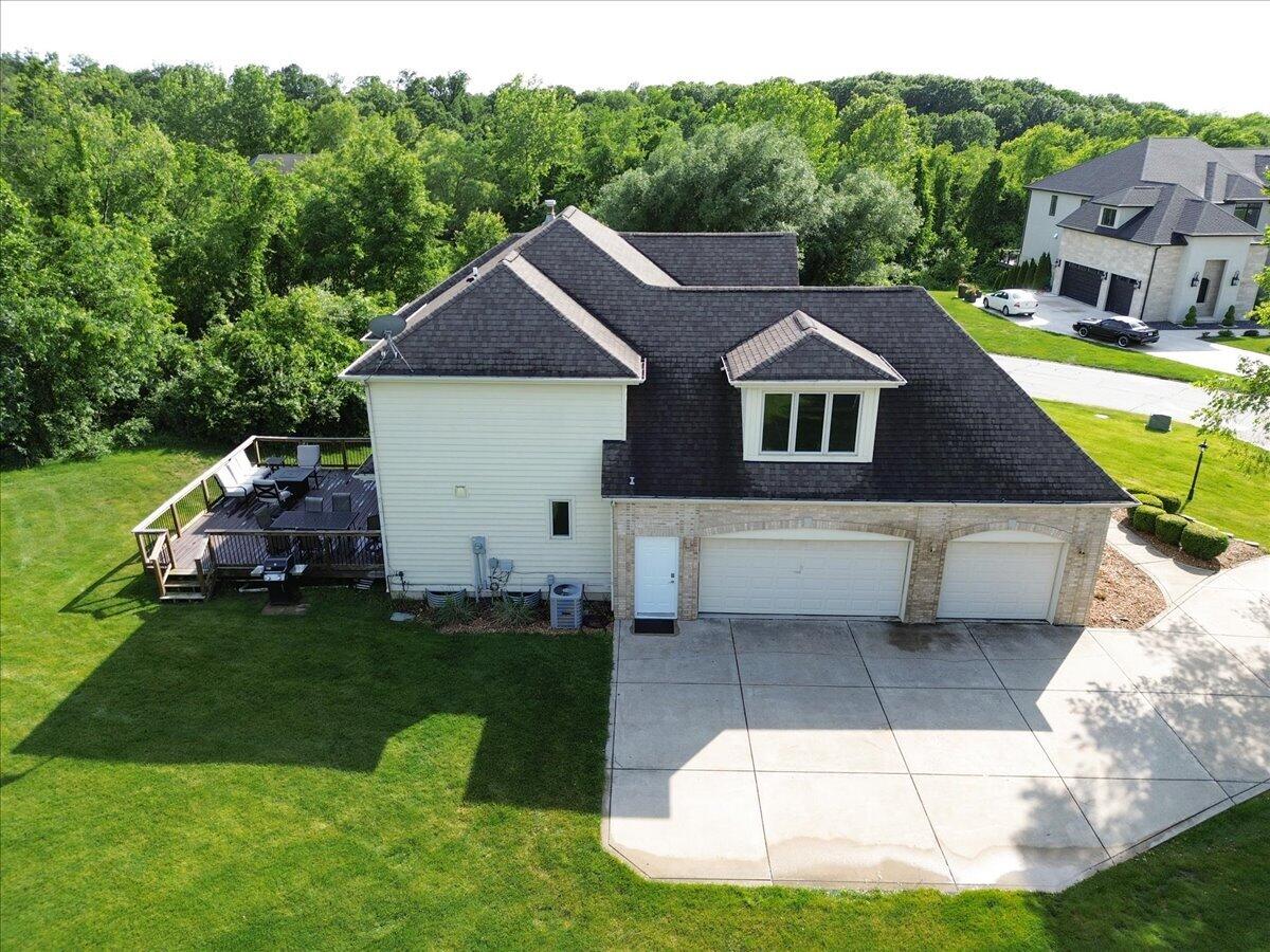 8751 Bridgewater Court Crown Point, IN 46307 - Photo 3 of 49 a aerial view of a house with a yard
