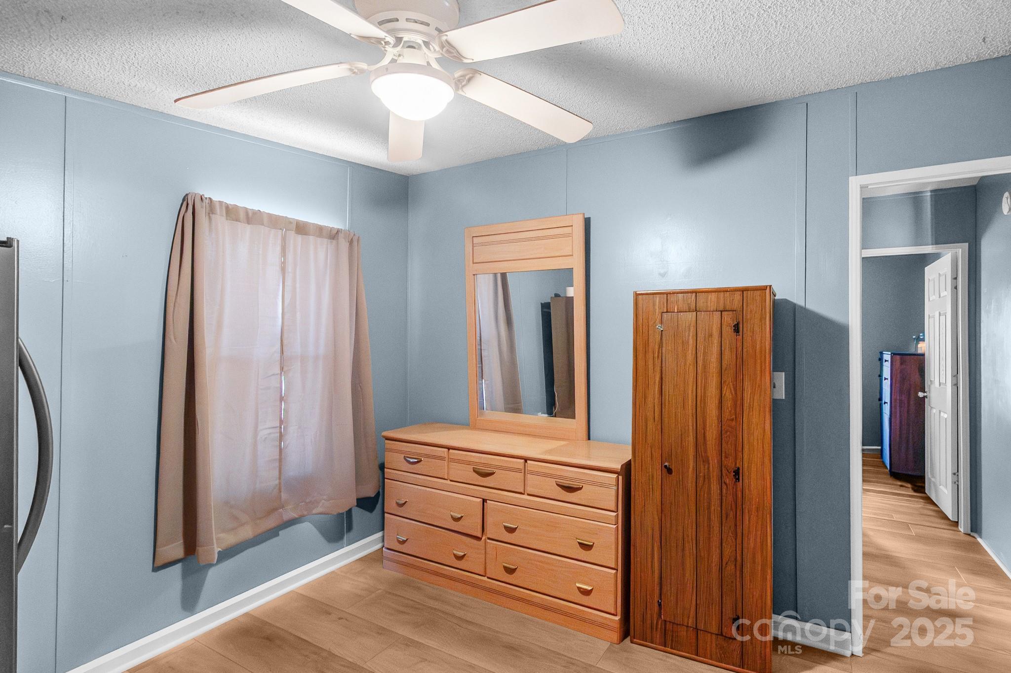 2214 Sojourn Road Marshville, NC 28103 - Photo 12 of 48 a room with closet and mirror
