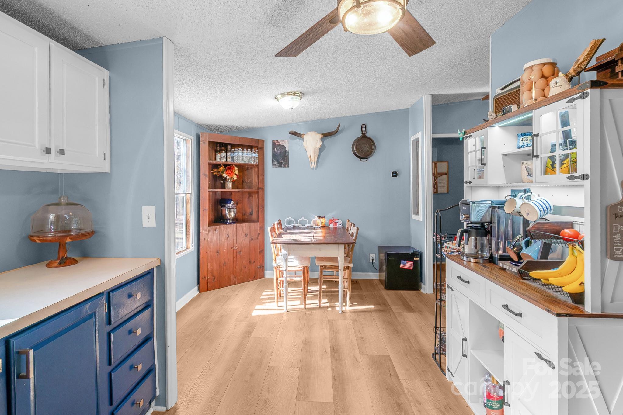 2214 Sojourn Road Marshville, NC 28103 - Photo 14 of 48 a view of a kitchen and dining room