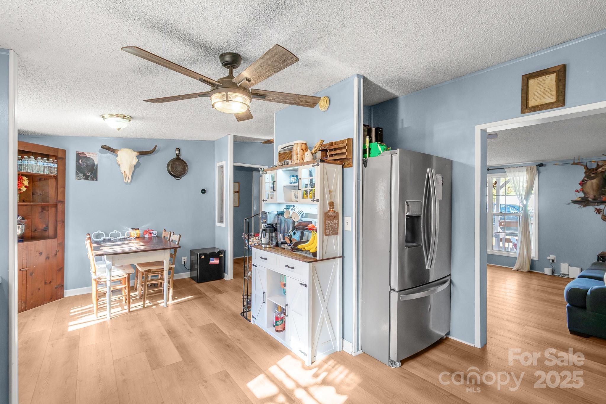2214 Sojourn Road Marshville, NC 28103 - Photo 15 of 48 a kitchen with stainless steel appliances a refrigerator and a refrigerator