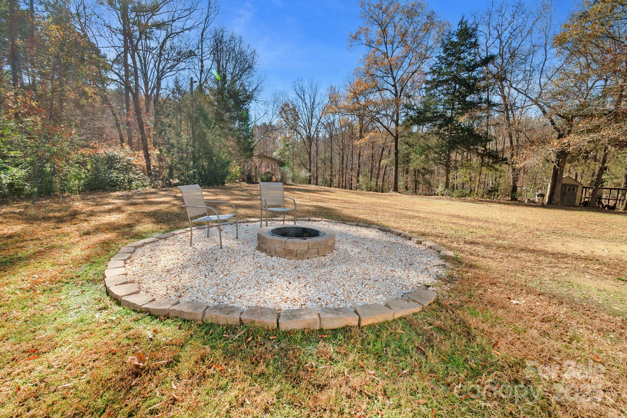 2214 Sojourn Road Marshville, NC 28103 - Photo 34 of 48 a view of a water fountain in the middle of a yard