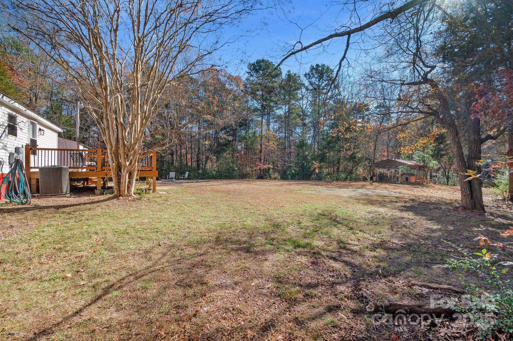 2214 Sojourn Road Marshville, NC 28103 - Photo 37 of 48 a view of a yard with a house