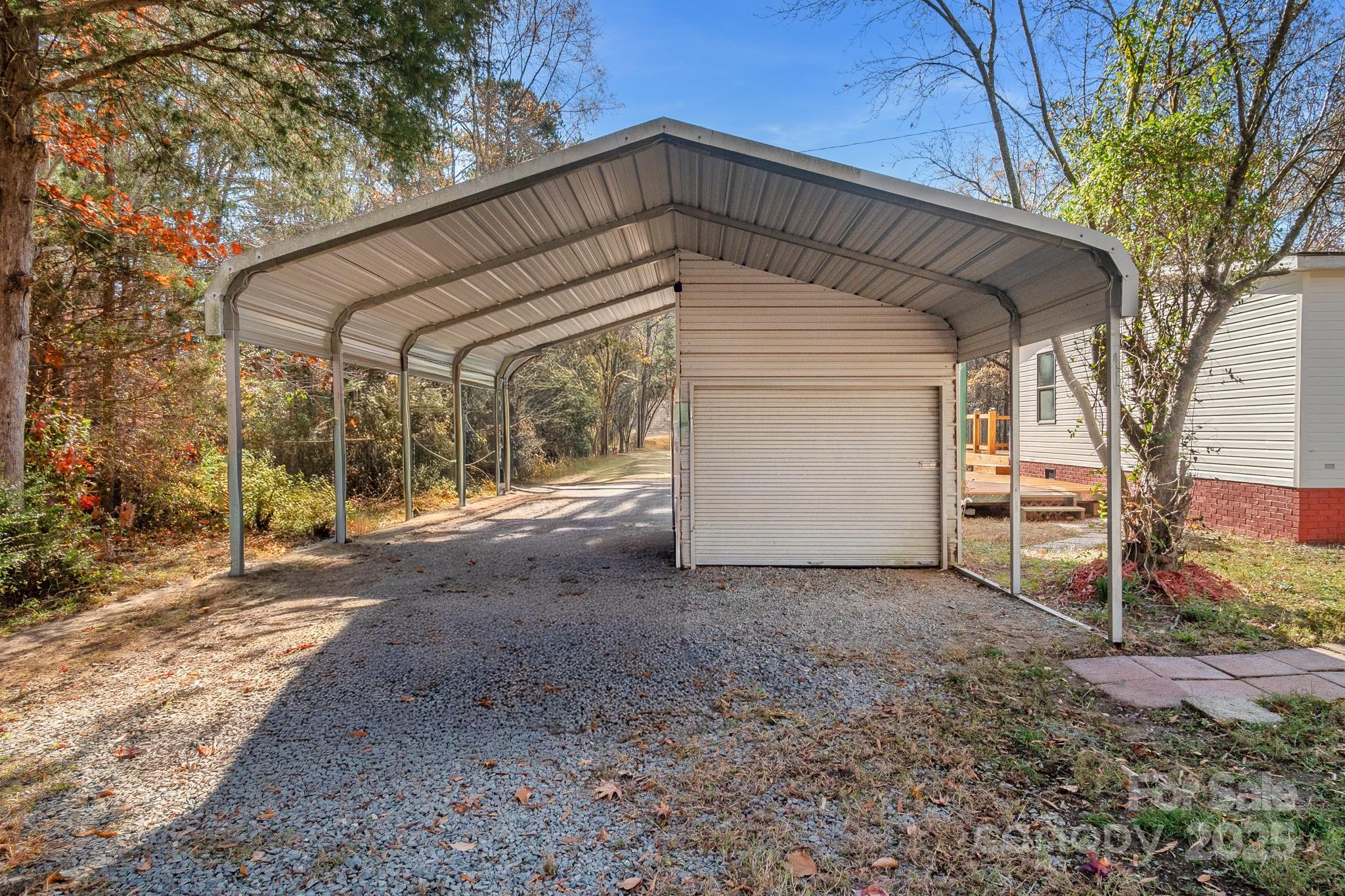 2214 Sojourn Road Marshville, NC 28103 - Photo 38 of 48 a view of a house with a yard
