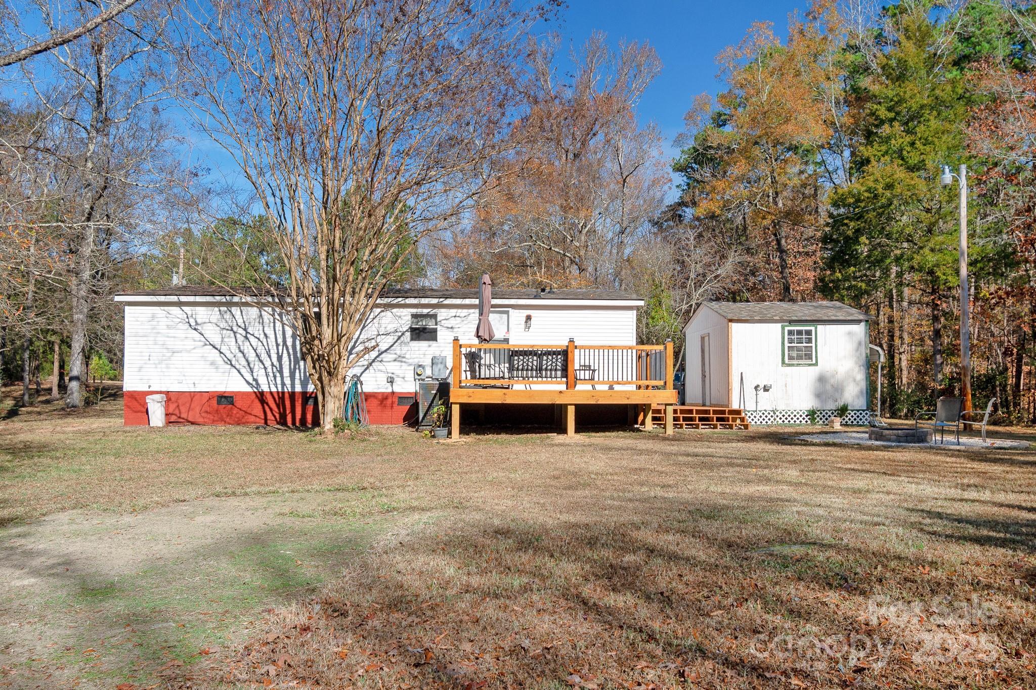 2214 Sojourn Road Marshville, NC 28103 - Photo 41 of 48 a view of a house with cars parked in front of house