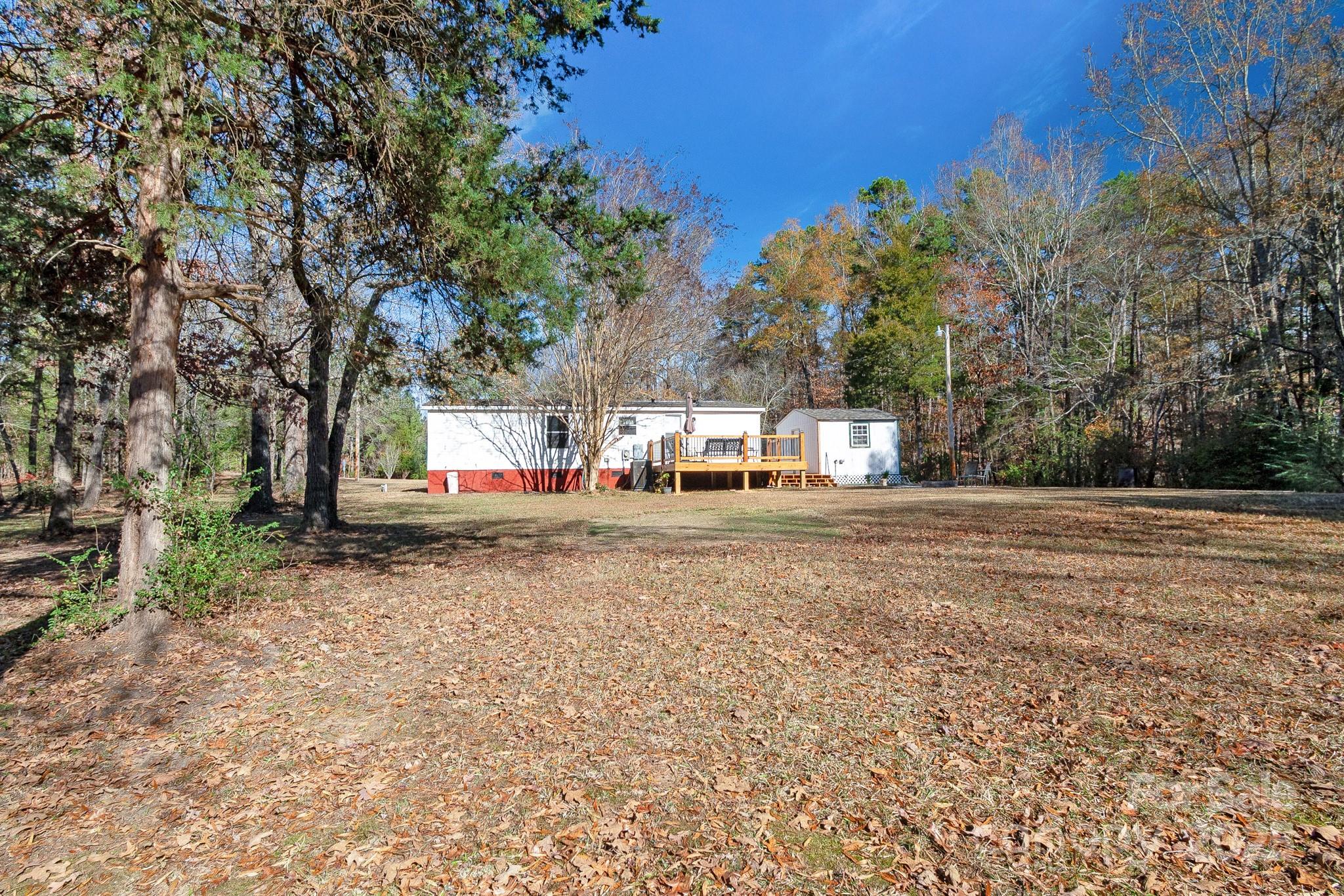 2214 Sojourn Road Marshville, NC 28103 - Photo 42 of 48 a view of road with large trees